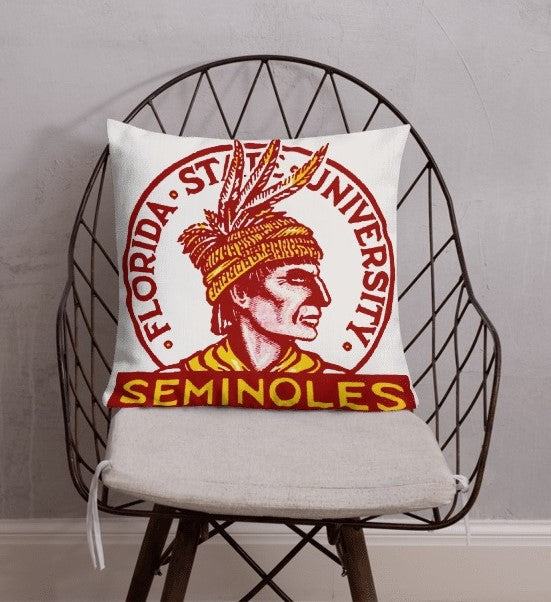 Florida State vintage booster club pillow with Seminoles logo on a chair.
