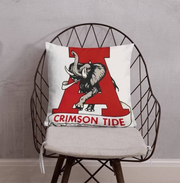Alabama Tide vintage booster club pillow on chair.