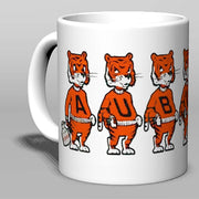 Ceramic mug with Auburn Vintage Booster Club tiger design, cream color.